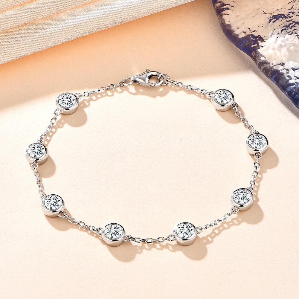 Bezel Set Round Moissanite Evenly Spaced Sterling Silver Bracelet