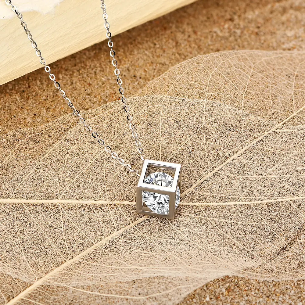 Cube Wrapped Solitaire Moissanite Necklace In Sterling Silver