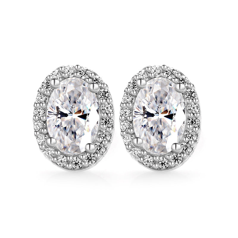 Halo Oval Cut Moissanite Stud Earrings In Sterling Silver