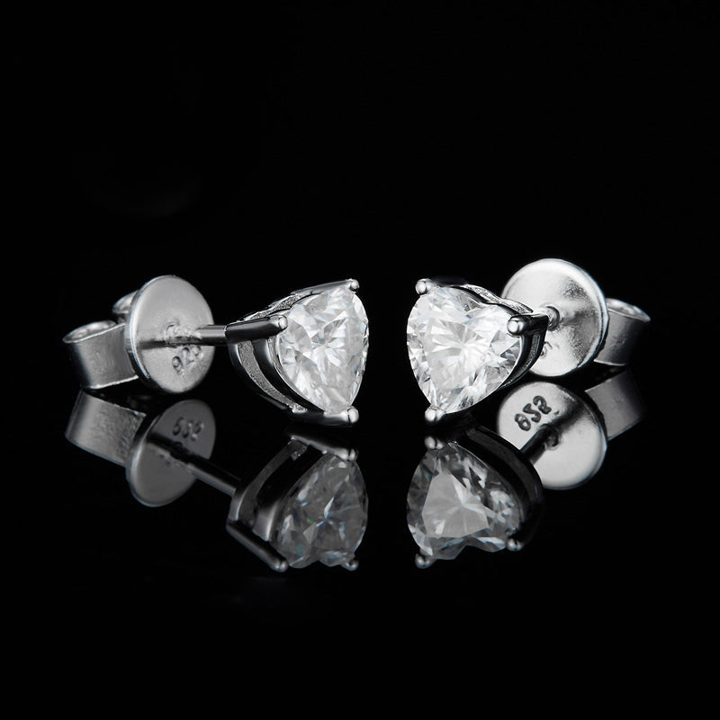 Solitaire Heart Cut Moissanite Three Prong Stud Earrings In Sterling Silver