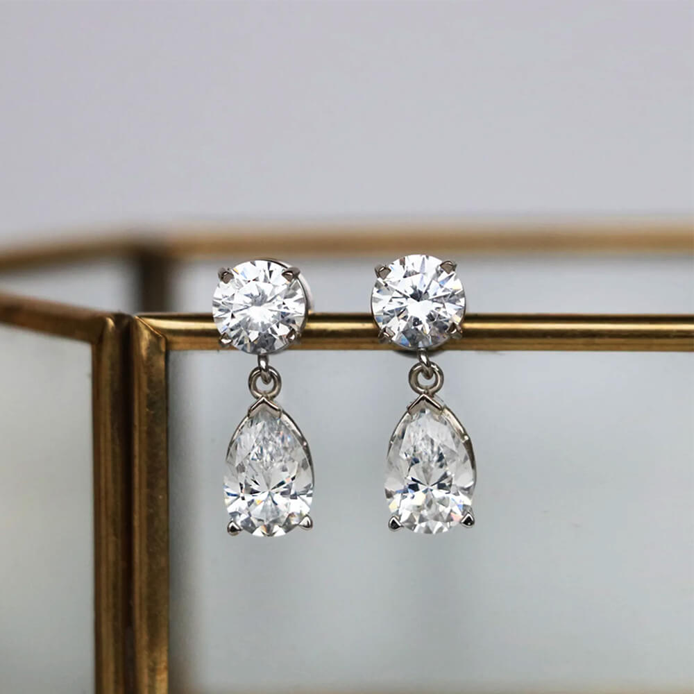 Pear Cut Moissanite Drop Earrings In Sterling Silver