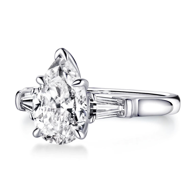 Three Stone Pear Moissanite And Tapered Baguette Engagement Ring