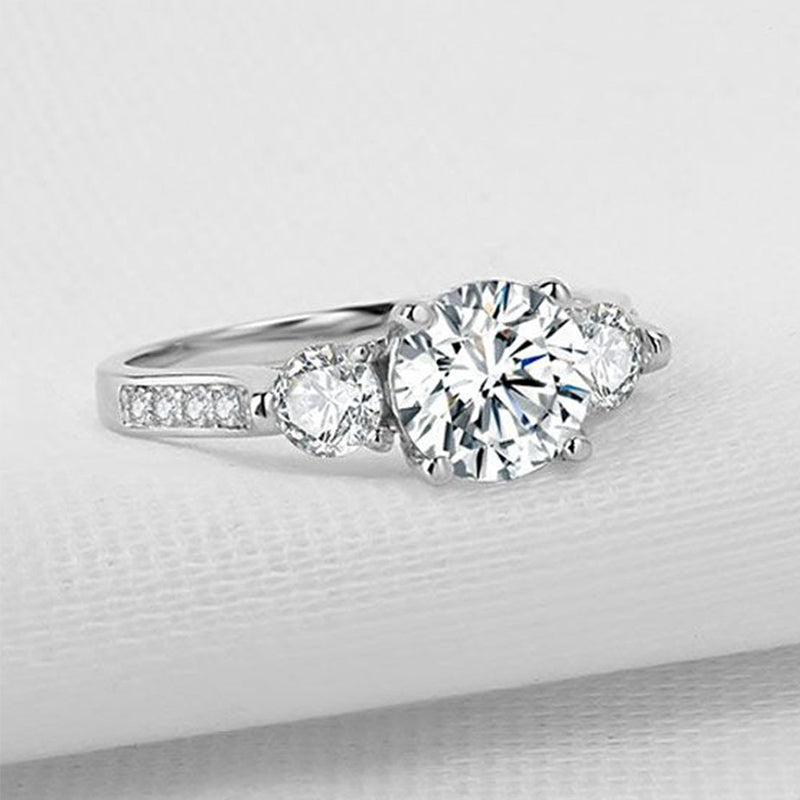 Three Stone Round Cut Moissanite Channel Set Sterling Silver Engagement Ring