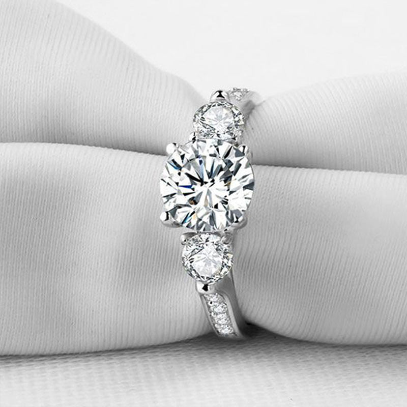 Three Stone Round Cut Moissanite Channel Set Sterling Silver Engagement Ring